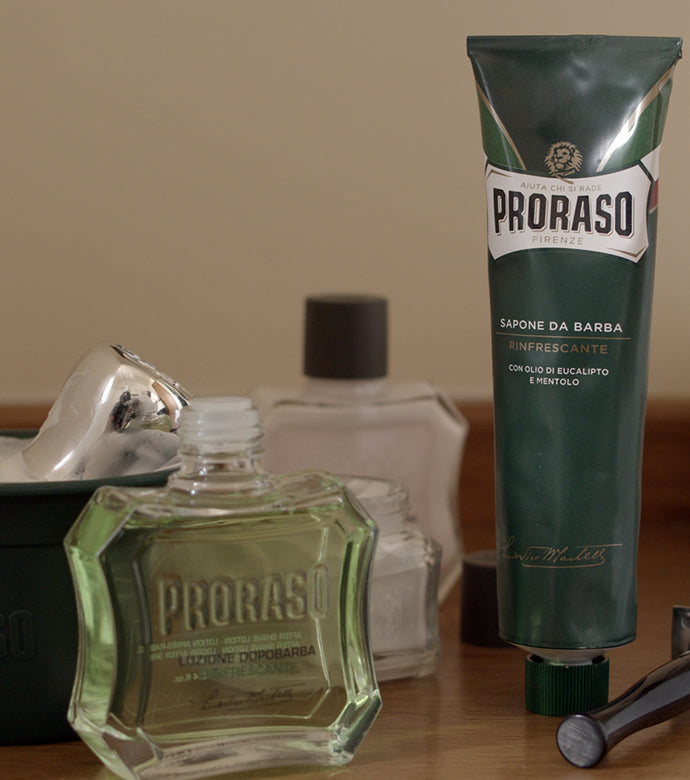 Proraso Refreshing sink side counter set up: Proraso Refreshing After Shave Lotion, Refreshing Shave Cream Tube, Refreshing Aftershave Lotion and shave bowl with a thick lather with a Proraso Professional Shave Brush.