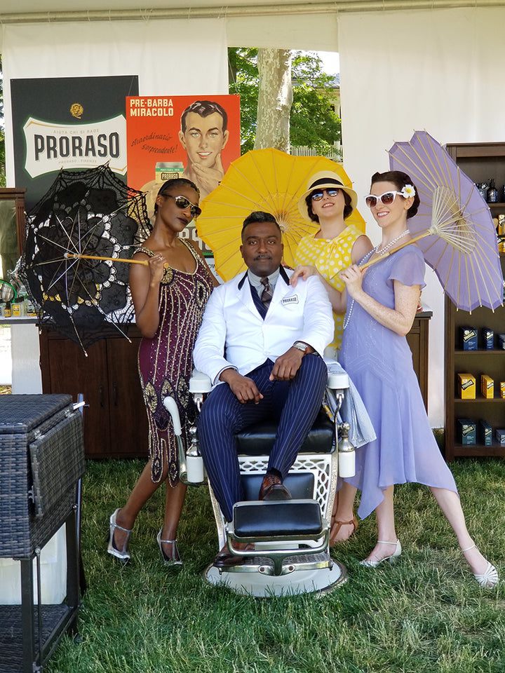 People dressed up in 1920's attire for Jazz Age Lawn Party