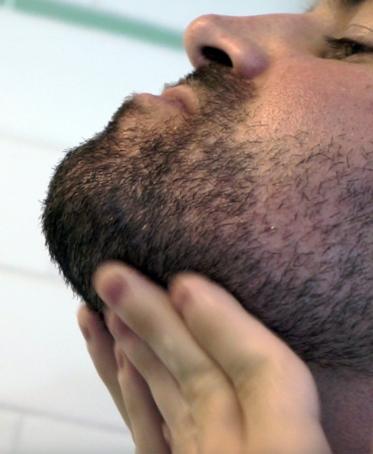 Beard Balm being applied to a short beard