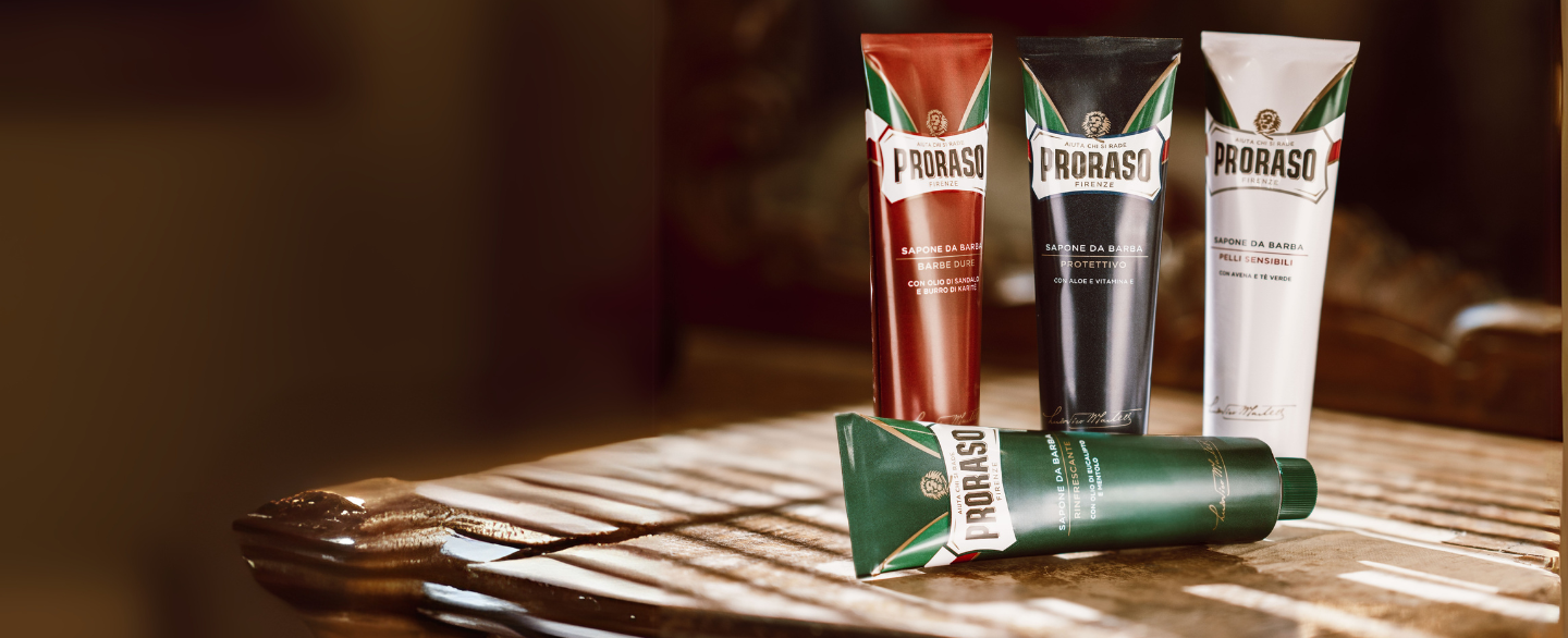 Image of Coarse Beard, Protective, Sensitive and Refreshing Shave Cream Tubes sitting on a brown table