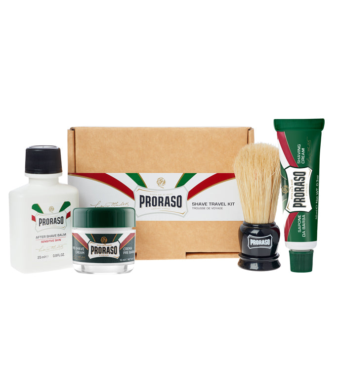 Our 4 piece Travel Shave Kit including Refreshing Pre-Shave Cream, Refreshing Shave Cream Tube, Sensitive After Shave Balm, and mini Shave Brush on a white background