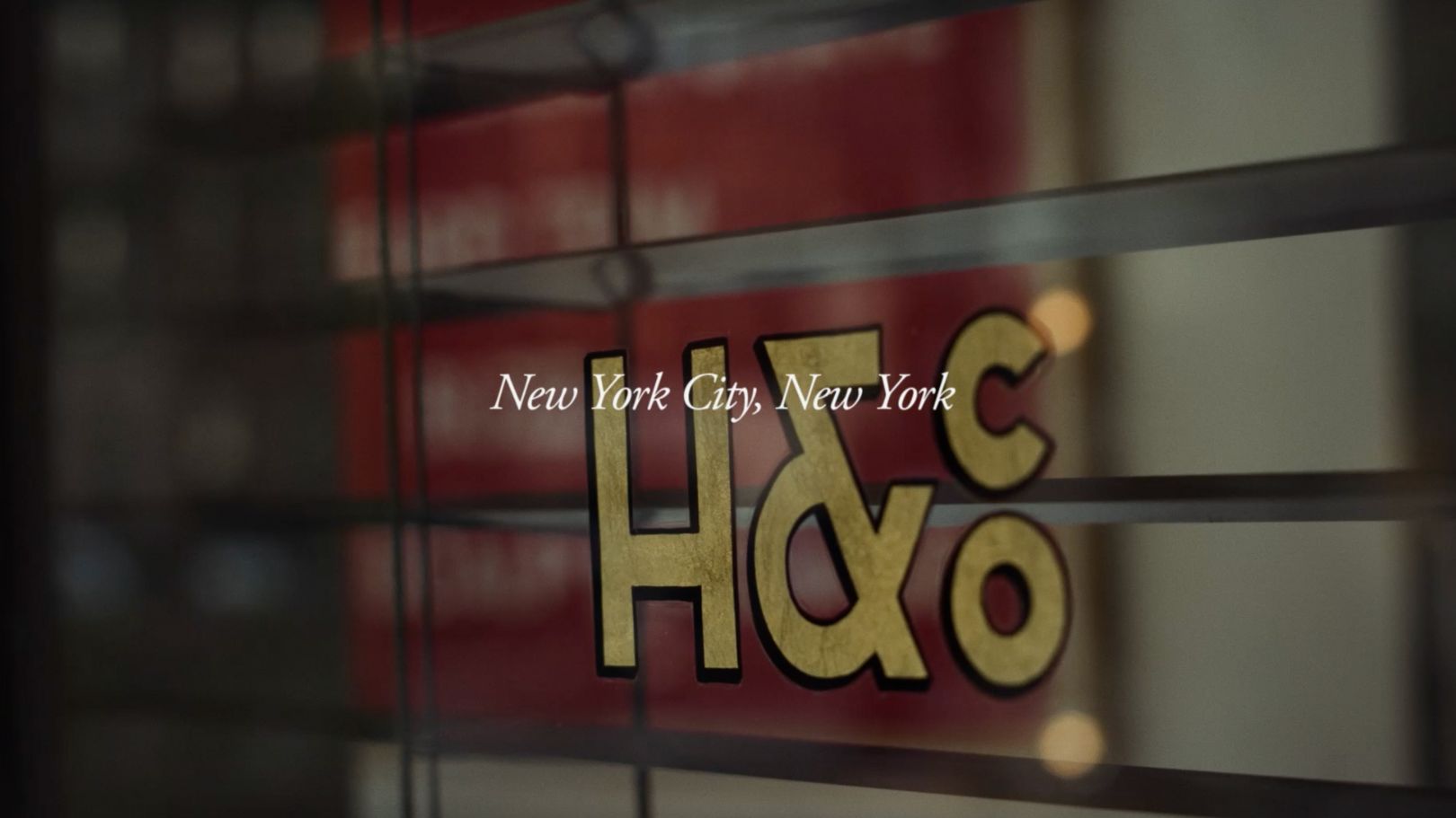 Image of Haar & Co. Barbershop's front door with the text overlay New York City, New York