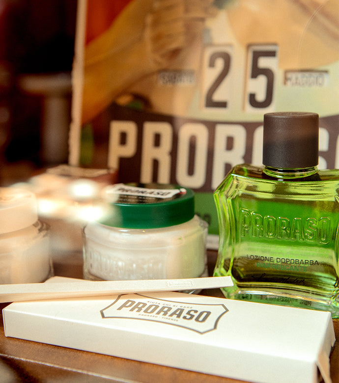 From left to right Sensitive Pre-Shave Cream, Nourishing Pre-Shave Cream, Refreshing Pre-Shave Cream and After Shave Lotion with Proraso Gino calendar in the background 