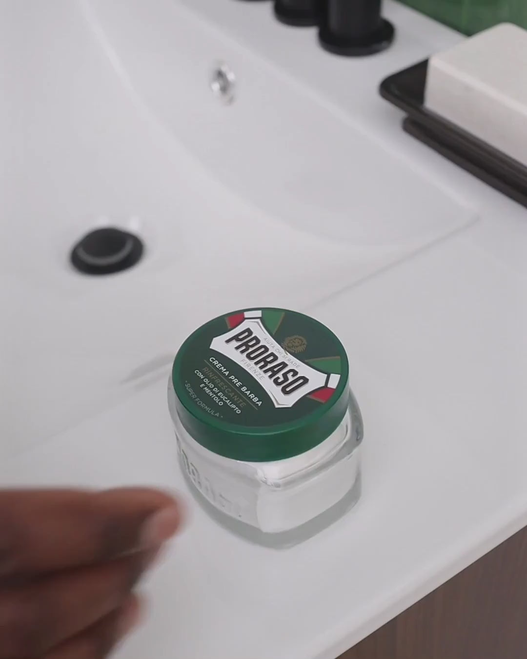 Video of man opening Pre-Shave Cream Refreshing for All Skin Types and scooping