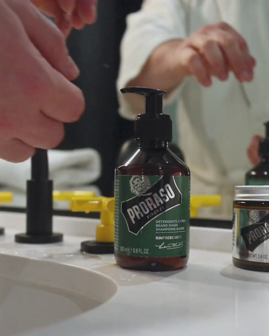 Man using Beard Wash in Refreshing Fragrance to clean his beard.