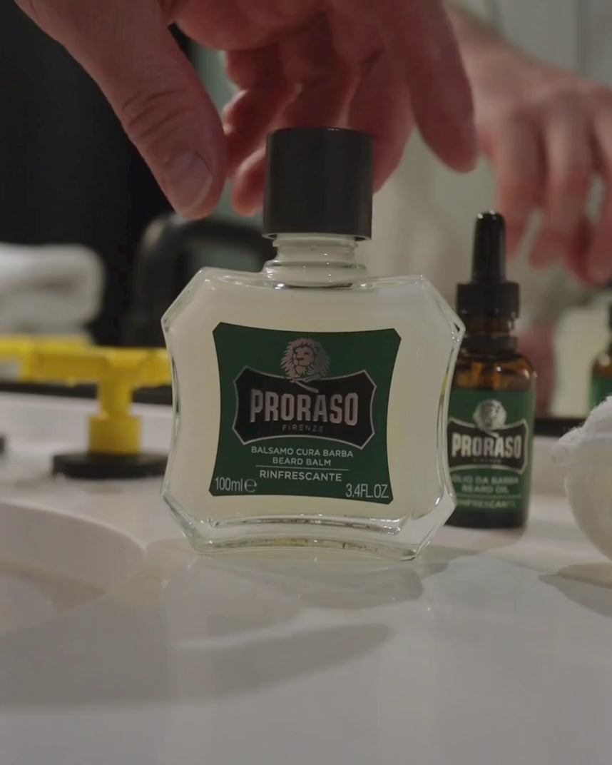 Man using Beard Balm in Refreshing Fragrance on his short beard.