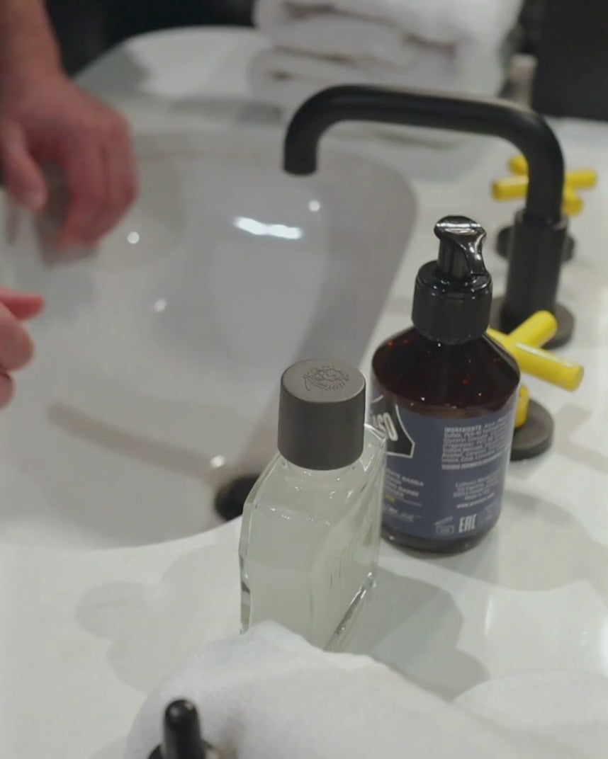 Man applying Beard Balm in Azur Lime Fragrance to short beard 