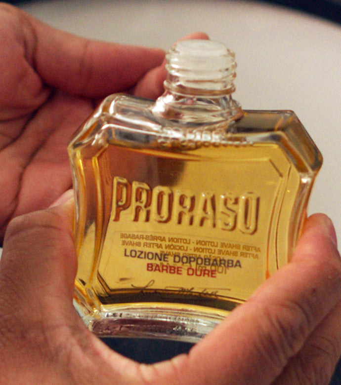  Coarse Beards After Shave Lotion being held in hand.