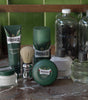 Proraso Refreshing Shave Lineup: Proraso Refreshing Pre-Shave Cream, Proraso Refreshing Shaving Cream Tube, Proraso Professional Shaving Brush, Proraso Refreshing Shaving Soap in a Bowl, Proraso Refreshing Shave Foam, Proraso Refreshing After Shave Lotion and Proraso Refreshing After Shave Lotion on the barber shop counter.