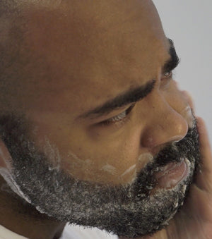 Proraso Azur Lime Beard Wash being used to clean a beard.