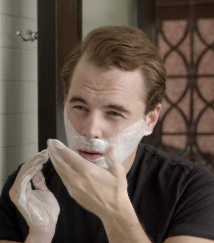 Proraso Coarse Beards Shave Foam being applied to face.