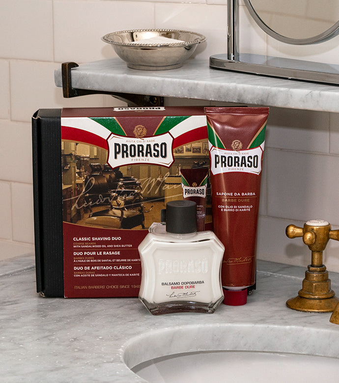 Proraso Nourishing for Coarse Beard After Shave Balm and Nourishing for Coarse Beard with Duo Box in the background.